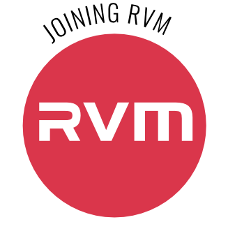 Red round icon with the white lettering ‘RVM’ in the centre. Above it, the words ‘JOINING RVM’ are written in capital letters in an arc. Link to information about career opportunities at RVM.